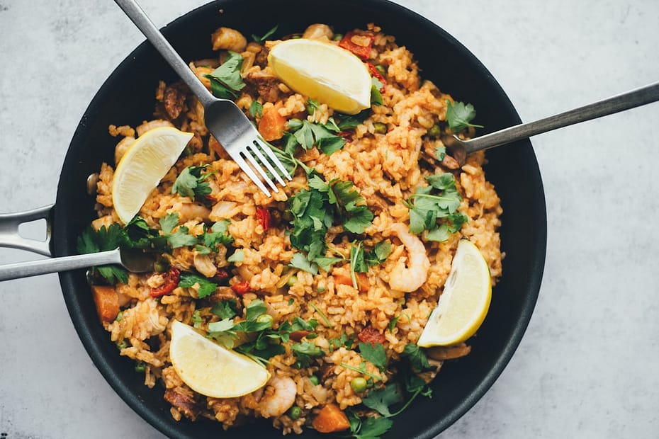 Sizzling caramelized ground beef stir-fried with fragrant Thai holy basil, garlic, and red chilies, topped with a crispy fried egg over jasmine rice