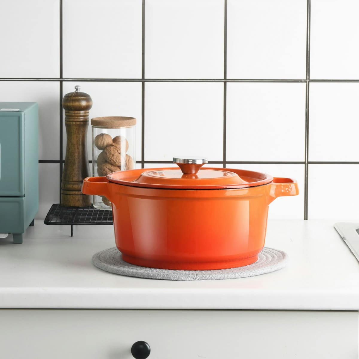 Gleaming stainless steel skillet heated on a kitchen stovetop